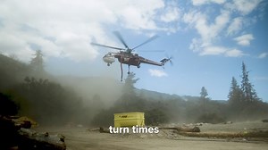 Helicopters play an integral role in wildland fire suppression by performing a variety of crucial tasks, however they are most well known for their water drops. Aerial water drops can provide two benefits: First, they have the ability to extinguish a section of fire. Should the drop fail to extinguish the fire, it often reduces heat and flame activity to a level where ground resources can safely and effectively engage the fire. “Turn time” - The amount of time it takes an aircraft to depart the 