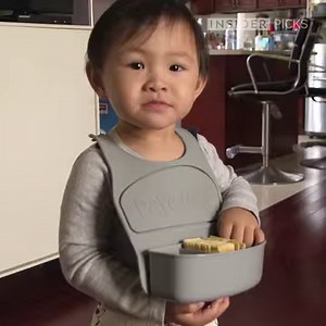 This bib holds children's snacks. 👍 If you want to buy one, use this link. We’ll make some money to support our videos: https://bit.ly/2PIZoOe | Inventions Insider