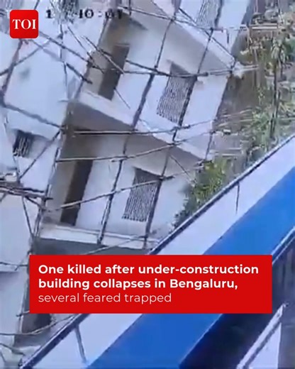 One worker died and seventeen laborers are believed to be trapped after an under-construction building collapsed in #Bengaluru amid incessant rain 5 people are currently trapped, one of them died, 14 were rescued and 5 are still missing, reports ANI More details http://toi.in/Hj9n3Z27 | The Times of India