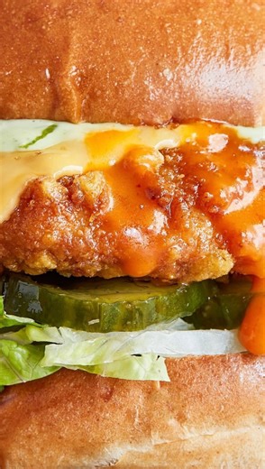 Our Buffalo Fried Chicken Burger is a spicy, tangy twist on a classic fried chicken burger - featuring halal buttermilk fried chicken breast with American cheese, buffalo sauce, ranch mayo, lettuce and pickles. 🍗✨ | Honest Burgers