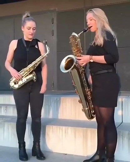 ✨ Two enchanting girls perform “Stand By Me” on alto and baritone saxophones