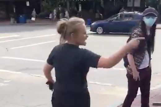 Video shows racist woman using N-word in sidewalk confrontation