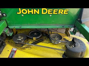 Replacing mower deck belt tension spring on John deer z225 #lawncare #problemsolving #dirtyhands