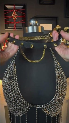Gold chain collar with dark leather base
