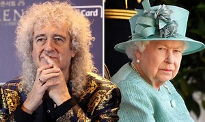 Brian May plays national anthem on Buckingham Palace roof