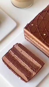 Chocolate Coffee Cake melt in your mouth 🤤 cake preparation take a bowl vegetable oil 40g cocoa powder 8g coffee liquid 50ml mix well cake flour 60g mix well egg yolks 4 mix well on a separate bowl egg whites 4 sugar 50g mix well mix the two liquids pan size 28x28 baking paper Bake in a preheated oven 160C 25 to 27min depends on the oven let it cool chocolate cream preparation take a bowl whipped cream 30g dark chocolate 30g melt on a double boiler mix well coffee liquid 15ml mix well on a sepa