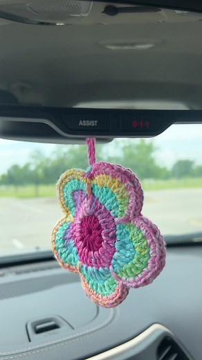 Currently using this flower pouch in my car with some car fragrance in it 🌸 but it could also be great for your closet or bathroom! I used a car fragrance refill from Bath and Body Works and it works perfectly! 🥰 I originally made this to hold AirPods, but I have found so many other ways to accessorize it! What would you use yours for? ✨Now listed on Et$y ✨ #crochet #crochetflower #crochetersoftiktok #crochettok #crochetaccessories