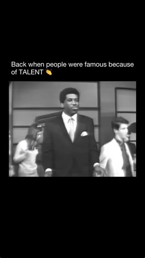 Purely History on Instagram: "Stand by Me by Ben E. King is one of the most enduring songs in popular music, released in 1961 during the early soul era. King co wrote the song with Jerry Leiber and Mike Stoller, drawing inspiration from a gospel hymn called Lord Stand by Me. The result blended spiritual roots with a simple, universal message that felt personal and timeless. Musically, the song is built on a steady bass line and gentle rhythm that gives it a calm, reassuring feel. King’s voice is