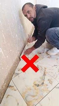 Professional installation of ceramic tile wall panels to a level finish