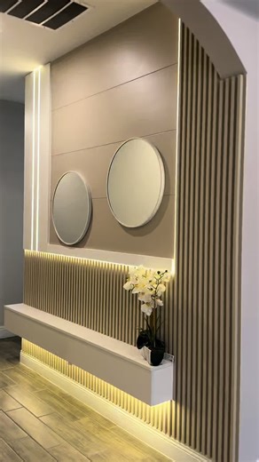 A modern entryway design with large mirrors and soft, light tones that bring elegance, brightness, and balance to the space. The perfect first impression when you walk into a home. ✨ #DGWoodDesigns #EntrywayDesign #ModernEntryway #MirrorDesign #NeutralInteriors