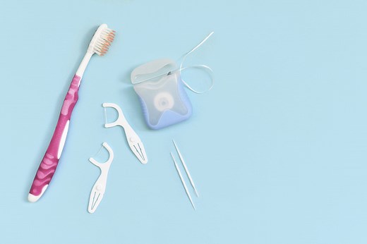 Should You Floss or Brush First? Here's What Dentists Recommend