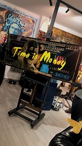 28K views · 523 reactions | “Time is Money” turns a black-and-gold $100 into a statement—sleek metallics, electric yellow script, and that high-gloss, collector energy. Built for the office, penthouse, or anywhere deals get done. Original available. DM to reserve. #cjsgalleryonline #popart #contemporaryart #luxuryinteriors #artcollectors | CJS gallery | Facebook