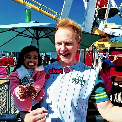She Is Only 2 Feet Tall & Riding A Giant Ferris Wheel!