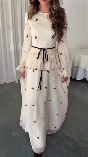 Drift through the day in this butterfly mesh maxi dress. 🦋