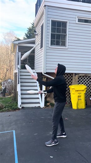 Quadruple flipping juggling club!! #juggling #viral #cool