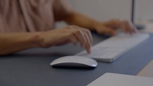 Close-Up of a Man Using a Wireless Mouse - Free Stock Video Footage | Coverr