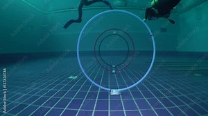 The camera moves through the rings installed on the bottom of the pool. Stock Video