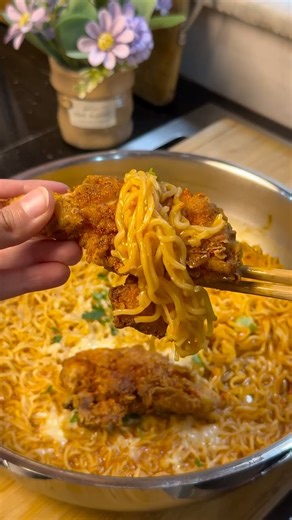 Hadia Noor on Instagram: "Spicy Korean noodles 🍜 INGREDIENTS 3 pack of crave instant noodles 1 tsp garlic 1/2 tbsp tomato paste 1/2 tbsp Korean chilli paste 2 cups water Noodles masala packets Cheese for topping @syncpr.official . . . . . #noodles#koreanfood#ramen#winters#recipes 🏷️ instant noodles ramen spicy recipes fried chicken"