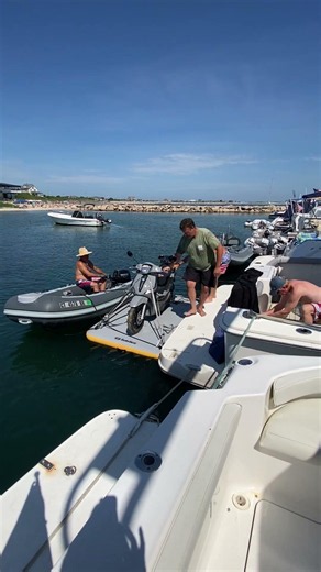 2of3 - transporting scooter to/from anchored boat using an inflatable dock.