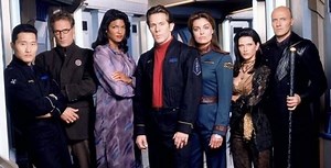 Crusade is an American spin-off television series from J. Michael Straczynski's Babylon 5, which ran from June 9 to September 1, 1999, starring Gary Cole, Tracy Scoggins, Daniel Dae Kim, David Allen Brooks, Peter Woodward, Marjean Holden, and Carrie Dobro. | Killer Kitsch