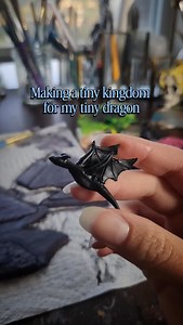 Now taking tiny dragon name suggestions 🥹 ✨️Dragon and landscape hand sculpted in @sculpey_official polymer clay ✨️ Hand painted in @liquitexofficial basics acrylic paint ✨️ Manipulated resin from @alumiliteco ✨️Details done with @posca_usa ✨️ Custom wooden frame from my amazing friend Lori #darkacademia #bookish #bookstagram #darkart #fantasybooks gallery wall handmade cottagecore resin art resin artist resin surreal surrealisim portal mythical magical magic fantasy lord of the rings game of t