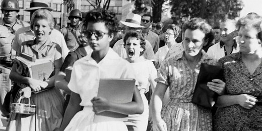 Elizabeth Eckford made history at age 15. Here's the full story behind the iconic photo.