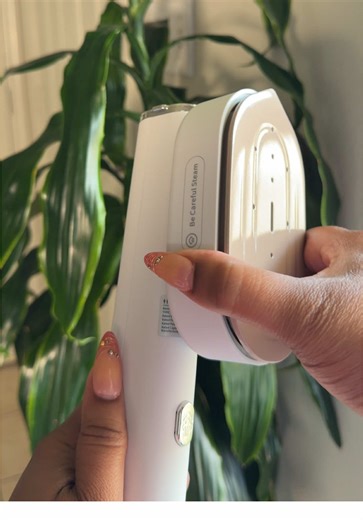 The portable steamer that you didn’t know you needed #travelessential #travelmusthave #portablesteamer #wrinklefree #traveltipsandhacks