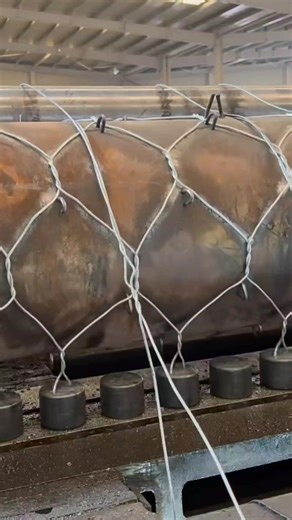 Industrial Wire Wrapping Process: Reinforcing a Massive Pressure Cylinder