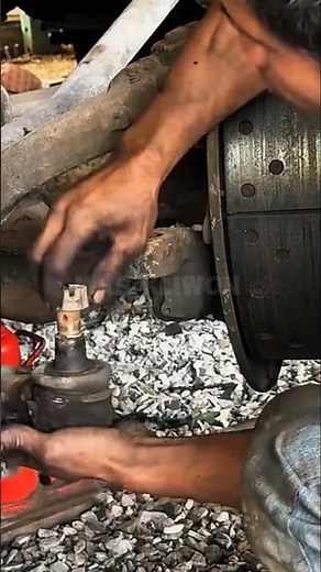 A mechanic demonstrates the technique for removing a stuck tie rod end on a truck#shorts #satisfying
