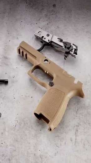 Changing out the grip of a SIG P320-M18 with a Wilson Combat Grip Module - Stop Motion #Shorts