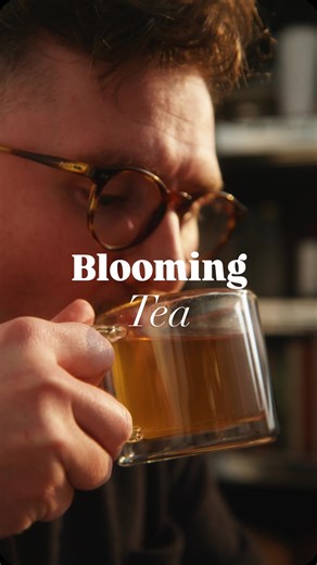 a love letter to the tea leaf 🍵🪷 This tea is called blooming tea - it’s made by hand sewing green tea leaves with edible flowers, then dried into the shape of a flower bud. When rehydrated in hot water, the tea slowly opens, giving the effect of a flowers bloom. Delightful. #tea #flowertea #tasty | Tasty UK
