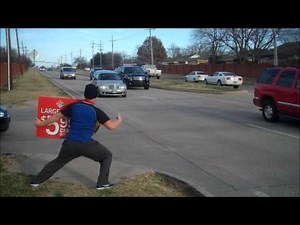 Dominos sign spinning