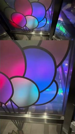 Riding the Up Elevator at Pixar Place Hotel