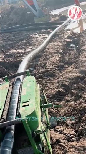 Cables | The machine laying cables is in operation.