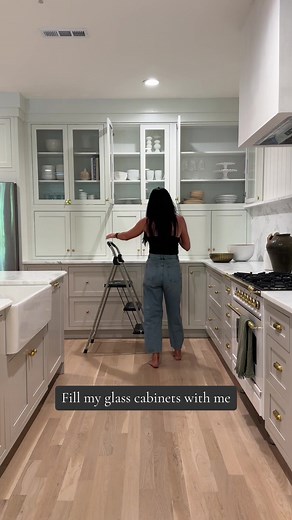 Styling Glass Cabinets: White Dishes & Warm Accents