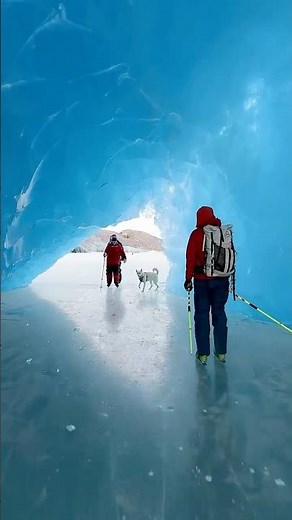 Ice skating through an iceberg arch in Alaska