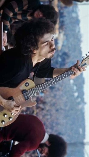 @rocknrroll on Instagram: "Carlos Santana’s Woodstock performance is one of the most iconic moments in the festival’s history. 🐍🌈⭐️ He was only 22 in 1969, and his band wasn’t very well known yet. Santana had taken LSD earlier in the day, thinking he had plenty of time before they would go onstage. But the schedule suddenly changed, and he was called up much earlier than expected. He has said many times that during the performance he felt like his guitar was turning into a snake in his hands, 