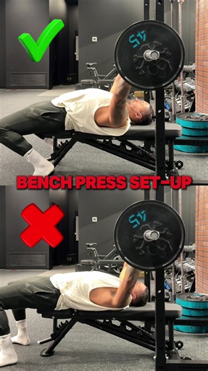 Bench Press Set-Up - Right ✅ Vs Wrong ❌ ✅ The Right Way ✔️ set-up with bar lined up around mouth area ✔️ use bar to shove shoulders down into the bench, and back towards hips ✔️ create small arch in low back, elbow slightly tucked to engage lats before unpacking ✔️ tuck legs into place before unpacking ✔️ keep shoulders and body set while unracking ❌ The Wrong Way ✖️set up with bar lined up at hairline or further ✖️wiggling / setting shoulders after unracking the bar ✖️back completely flat on be