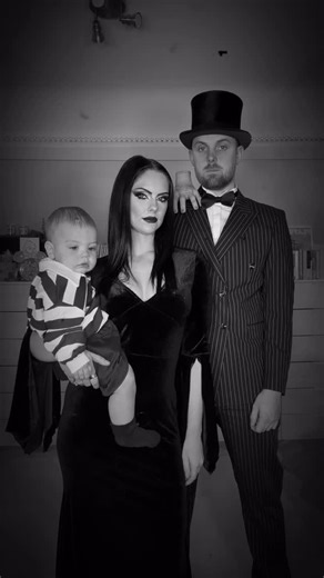 Sophie Hannah on Instagram: "Our first family halloween costume 🖤 The Addams Family ~ Morticia, Gomez & Pugsley Addams ☠️ Not sure Björn liked dressing up as Pugsley though, he much preferred being flounder 🤣 [family halloween costume, halloween]"