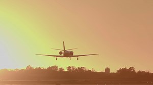 Small Private Jet Landing At Airport Against Stock Footage SBV-349119033 - Storyblocks