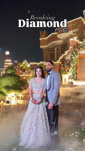 Fatehbir Singh on Instagram: "Revolving diamond cake 😍 #luxury #cake #hangingcake #chandeliercake #event"