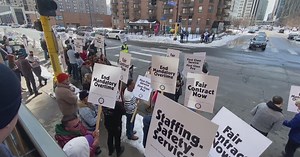 Mail carriers picket outside Minneapolis post office to call for end to mandatory overtime