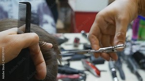 Cutting hair with electric razor. Close up of male haircut. Male hairstyle with electric razor. Barber doing styling haircut. Hairdresser cutting hair