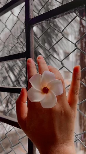 Elegant White Flower Ring Close-Up on Hand