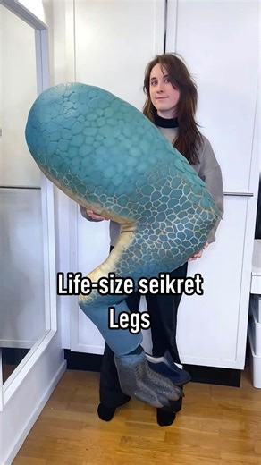Trine on Instagram: "Legs for days! 🦵🏻 Look how big these HUGE legs for my seikret are compared to me 🤣 Absolutely love the scale of this project (no pun intended) 🦖 I think the scale-making technique turned out so good and though I almost went crazy burning them all, I can definitely see myself using the technique for another project in the future 😄 How do you think they turned out? As mentioned in the video; a HUGE thank you to @cosplayshop.be for sponsoring this project! I used about 5 o