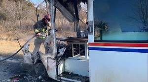 Kansas postal worker saves Christmas packages from mail truck fire
