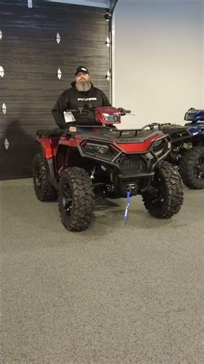 Your Beared Salesman with New Fourwheeler on our floor!!