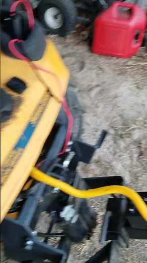 Badlands ZXR 2500 lb ATV winch mounted on Johnny Bucket Electric Sleeve Hitch Cub Cadet GT2544