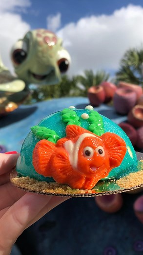 16K views · 60 reactions | I’m Nemo Cheesecake — $6.29 10/10 Classic Cheesecake coated in a shimmering Blue ‘Ocean’ Glaze with Graham Cracker ‘Sand’ and White Chocolate Nemo If you’re visiting Disney’s Art of Animation Resort, you might just end up looking for Nemo. This beloved little clownfish is now available as a dessert from Landscape of Flavors.!! Do you like cheesecake!? | Christina Wait | Facebook