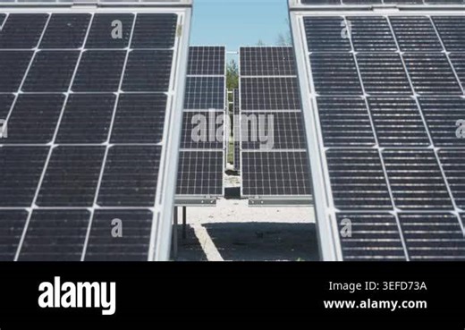 Bifacial photovoltaic solar panels array on metal ground mount racking system. Professional installation at renewable energy farm for high efficiency power generation on sunny day outdoors Stock Video Footage - Alamy